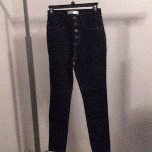 Black jeggings, yellow stitches, talk prices